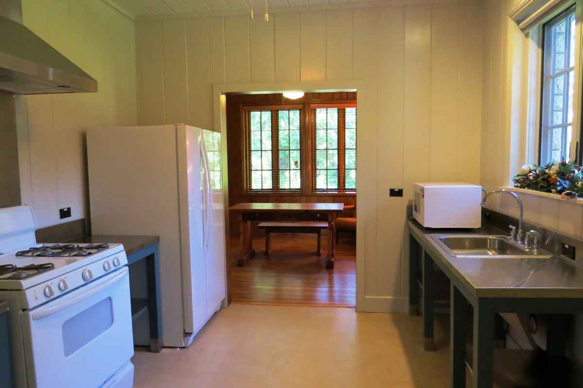 A view of the kitchen. Remember to bring your own cooking and eating utensils and a coffee maker.   