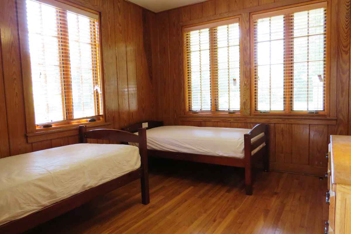 Another view of the bedroom with two twin beds.