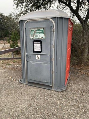 An ADA portable toilet