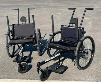 two black outdoor wheelchairs