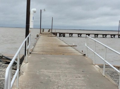 Pier with railings and some boards missing