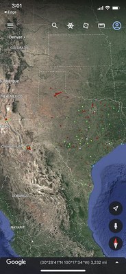 Screenshot of a phone showing a zoomed out view of Texas. Trails appear a dots across the map.