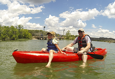 father and daughter in canoe