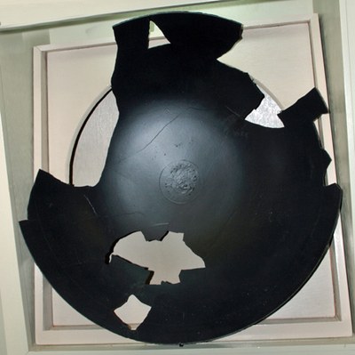 Broken pieces of wok assembled in box