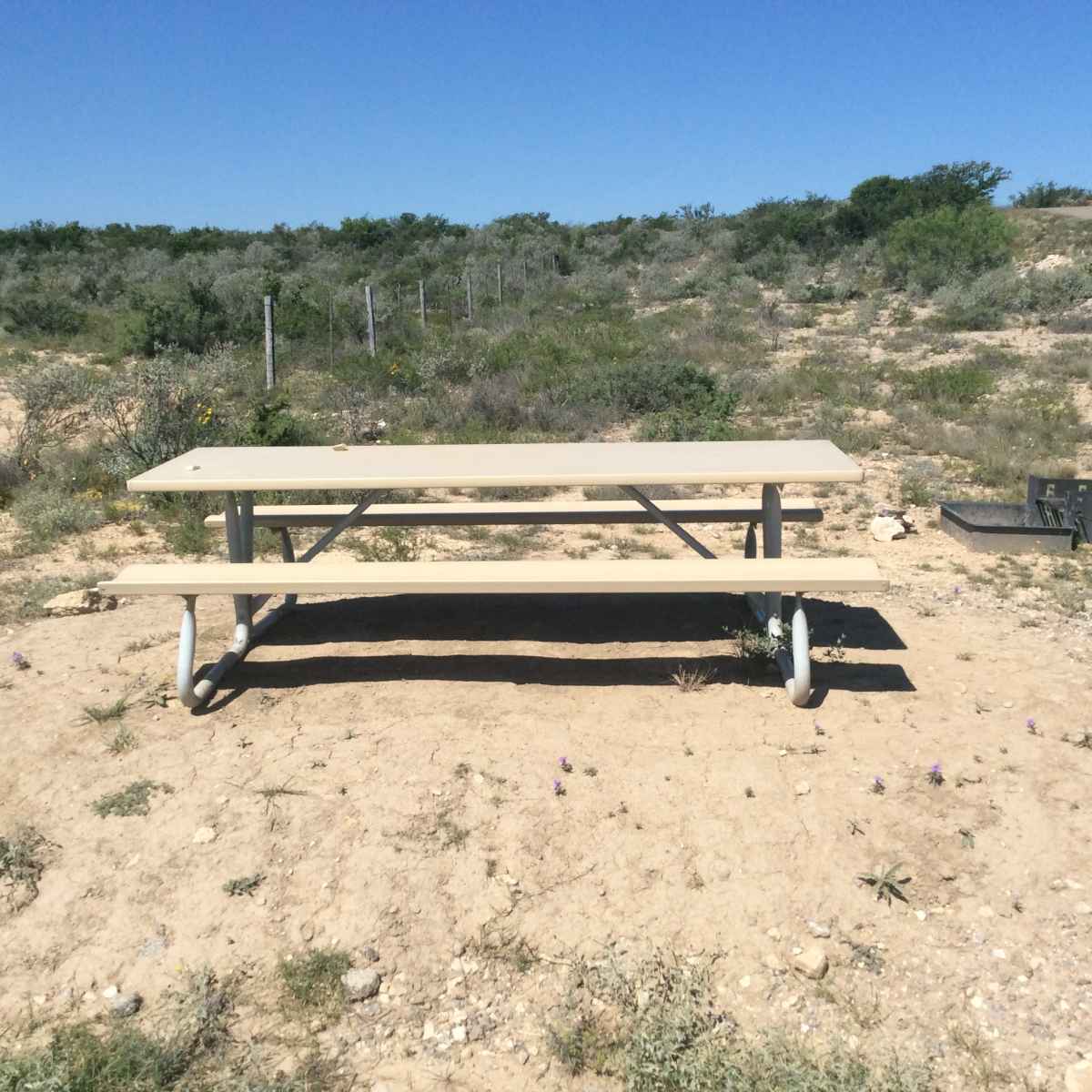 The picnic table at Campsite 32 in the Roadrunner Flat Primitive Camping Area. 