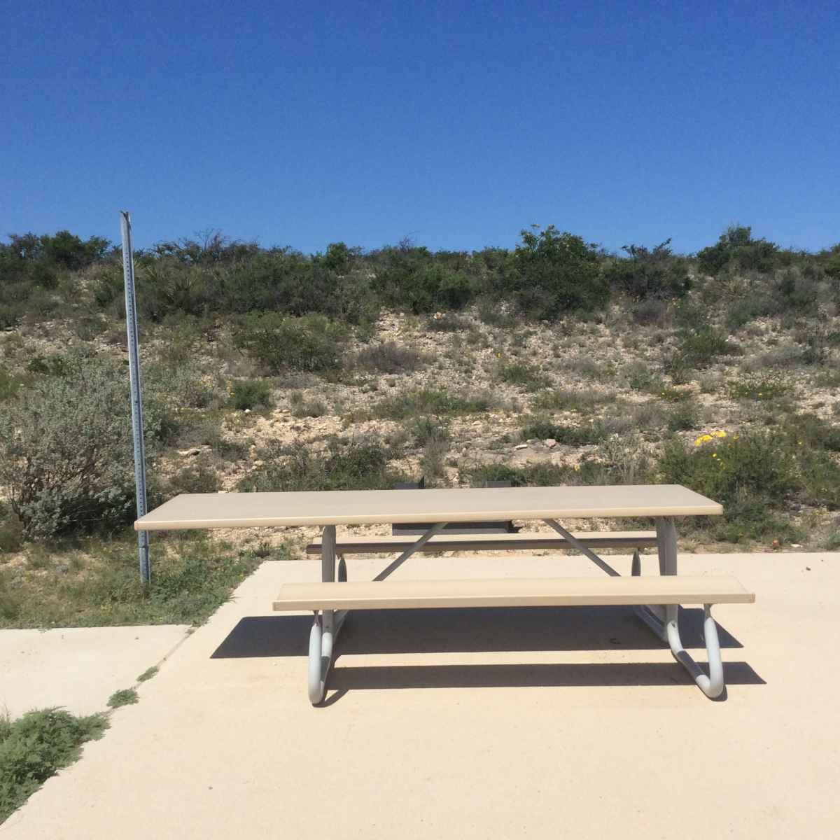 The picnic table at Campsite 35 is wheelchair friendly. 