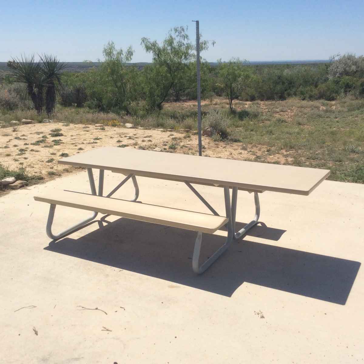 The picnic table at Campsite 44 is designed to be usable by people in wheelchairs. 