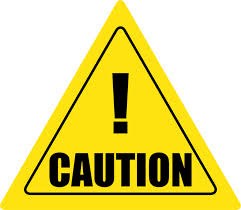 bright yellow caution sign