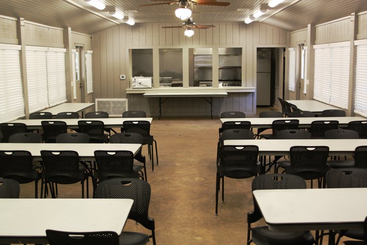 In the dining area looking at the kitchen.